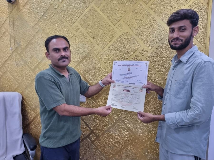 Graduate holding certificate and marks sheet together