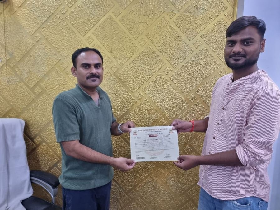 Marks sheet handover to a graduate